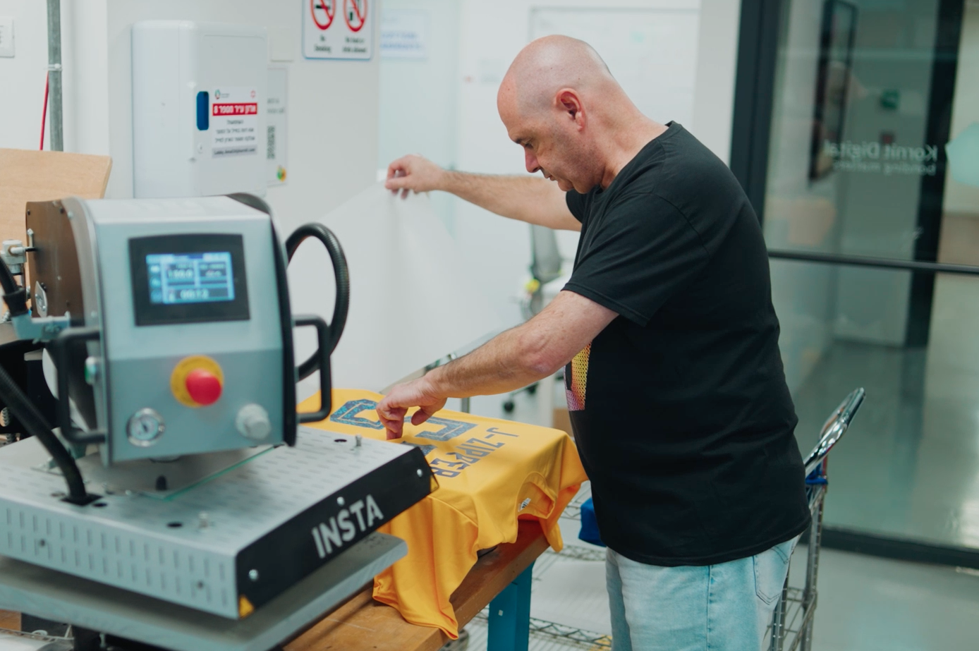 man operating a printer